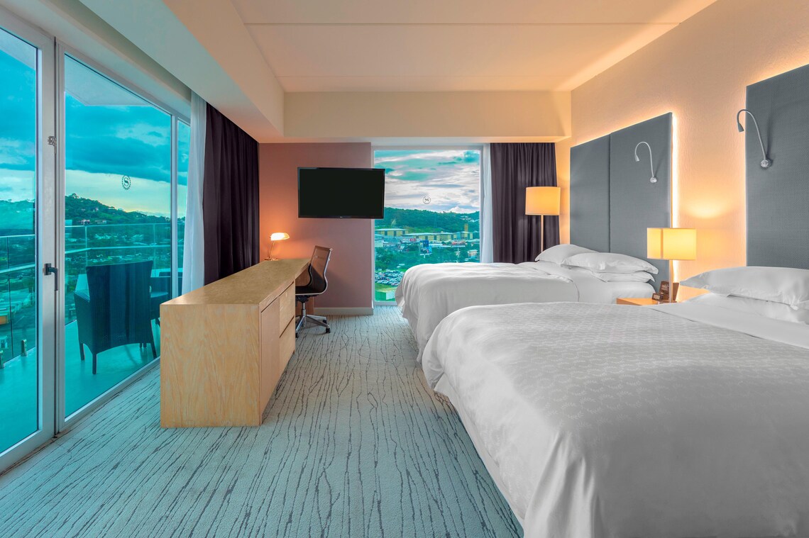 Deluxe Room featuring 2 Queen Beds - Image 1